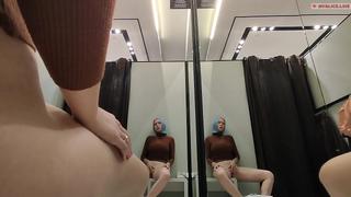 Risky masturbation in a fitting room in a mall. I wanted to take a risk and get a quick orgasm by fucking myself in the fitting