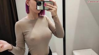 Spying on a blonde masturbating in a fitting room. Strong orgasm in public place